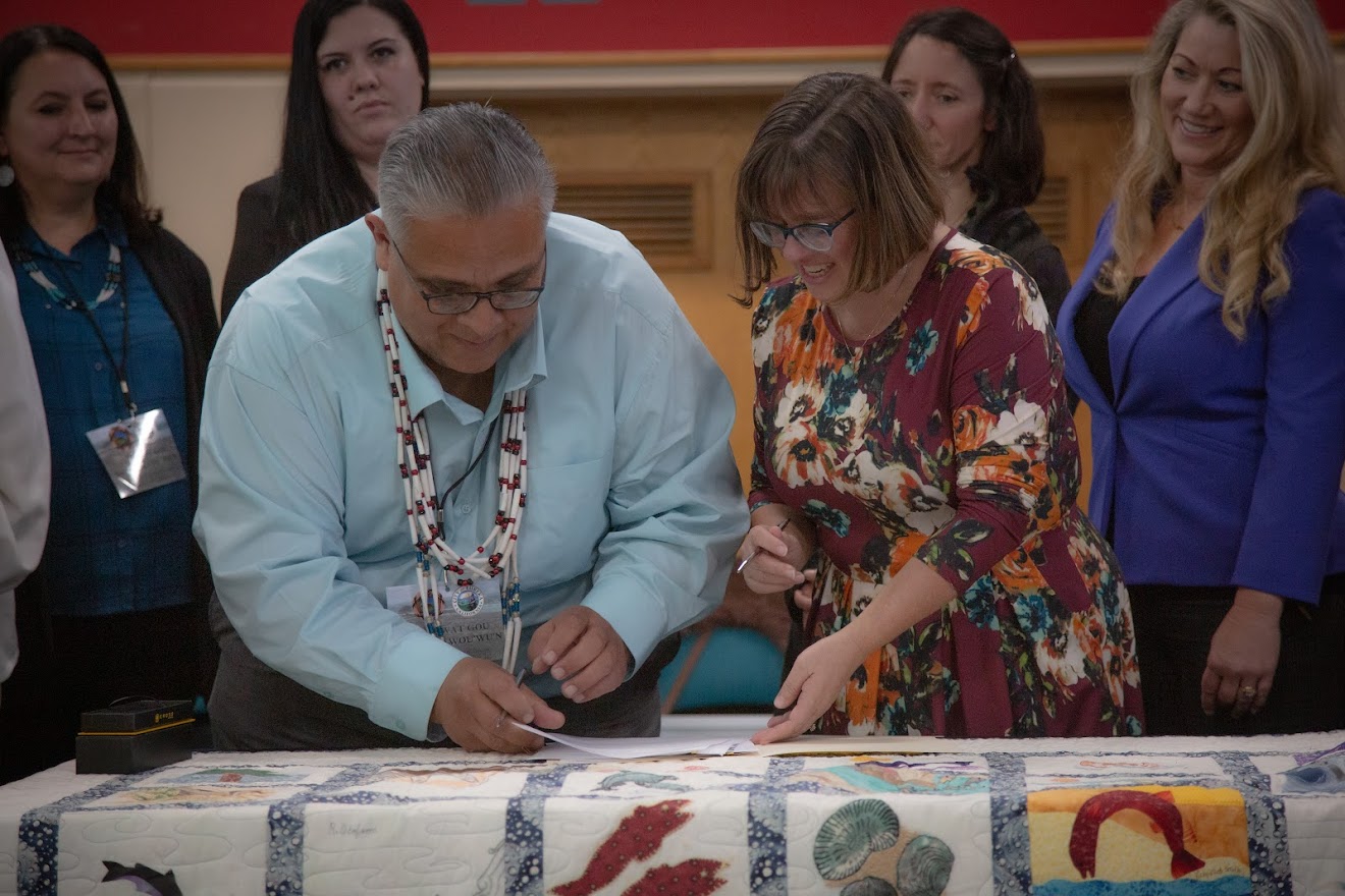 Wiyot Tribal Council and Eureka City Council signing Tuluwat land return 2019 Eureka, CA.